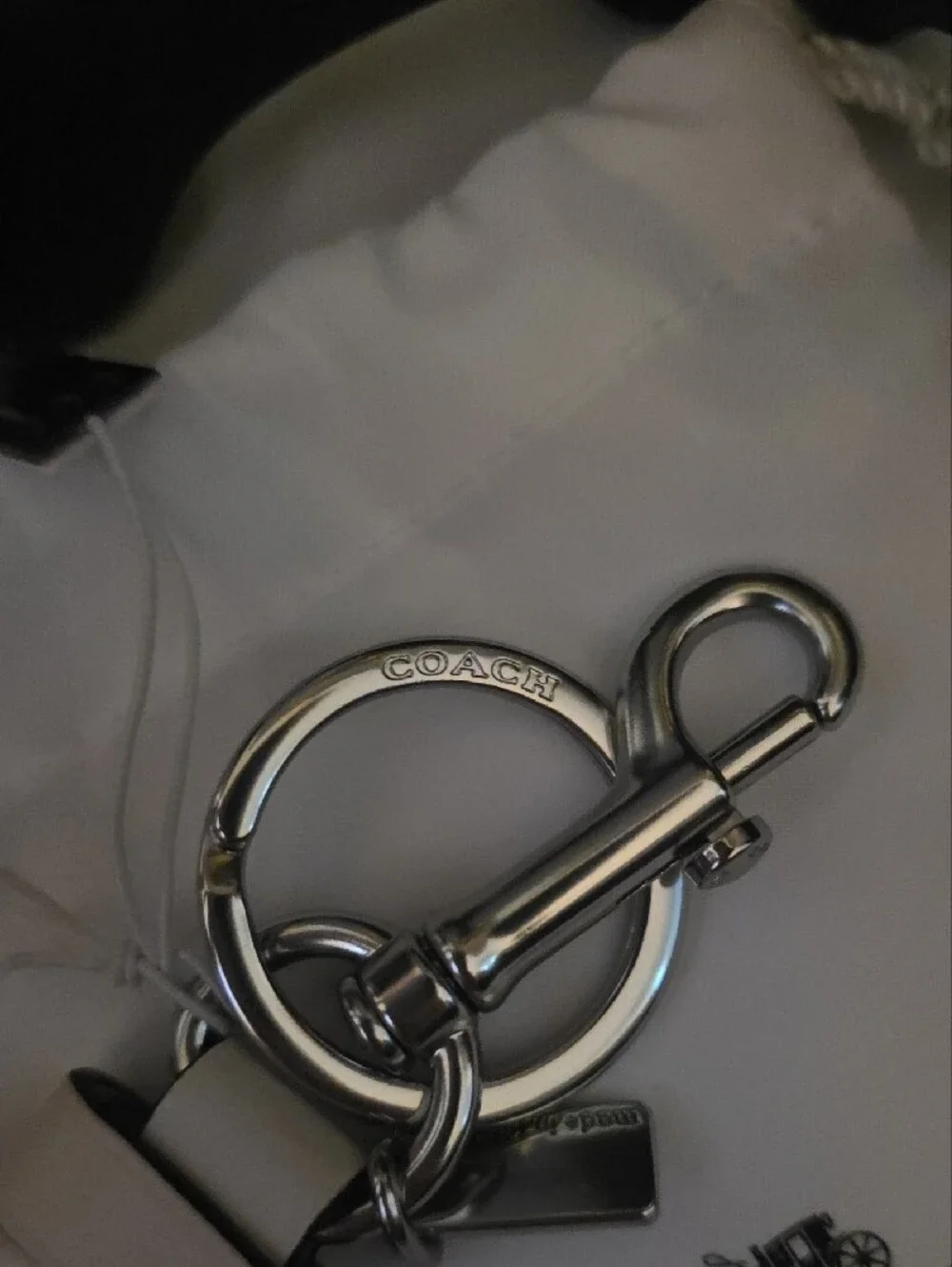 Coach Silver Leather Turn-Lock Keychain